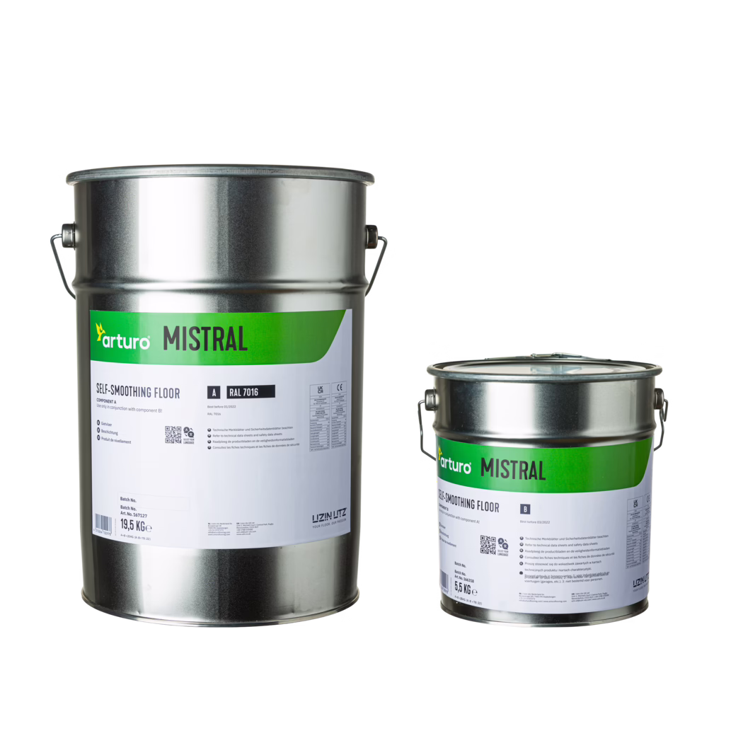 Arturo_Dummy_Mistral_25kg_02-2023 Two metal product containers of different sizes on a white background. Both cylindrical silver tins have side handles and green-and-white labels reading 'arturo MISTRAL' with product information including 'Self-smoothing floor' and RAL 7016. The larger pail on the left is noticeably taller than the smaller can on the right. Studio-style, evenly lit product shot with neutral shadows, focusing on packaging, branding and size difference.
